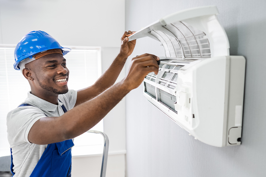 technician checking new air conditioning deer park tx