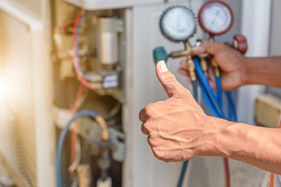technician hand close up doing a thumbs up after repairing houston tx